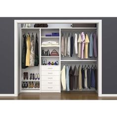 an open closet with clothes and shoes in it