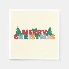 a card with the words merry christmas written in multicolored letters on white paper