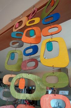 multicolored wooden circles hanging from the ceiling