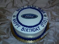 a birthday cake with the words built ford on it and an oval design in blue