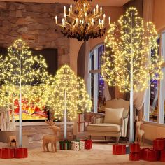 a living room decorated for christmas with lighted trees and deer figurines on the floor