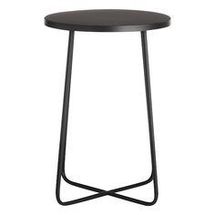 a black table with metal legs and a round top