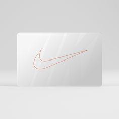 a white card with an orange nike logo on it