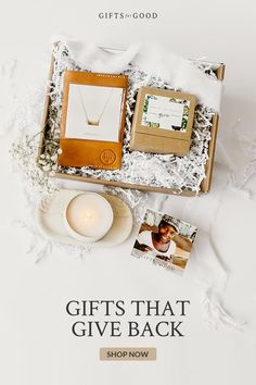 an open gift box filled with personal items on top of a white tablecloth and the words, gifts that give back