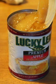 a can of lucky leaf premium apple jelly