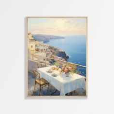 a painting of a table and chairs on a balcony overlooking the ocean with flowers in vases