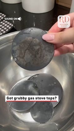 a person is stirring some food in a metal bowl on top of a stove with the words, got grubby gas stove tops?