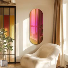 a living room with a chair, potted plant and large round mirror on the wall