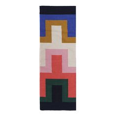 a multicolored rug with an abstract design on the front and back side,