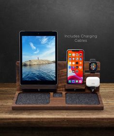 an apple watch, ipad and other electronics on a wooden stand with the caption includes charging cables