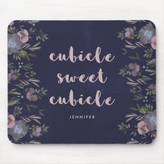 a blue mouse pad with flowers and the words cuddle sweet cuddle on it