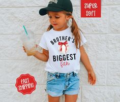 You are sure to love these adorable baseball Tees  Made with only the softest brands which are Rabbit Skins and Bella Canvas.  Perfect for the ballpark. LEAVE YOUR CHILD'S NAME IN THE PERSONALIZATION BOX Thanks so much for shopping with me! Please message me with any questions you may have! I am always available to help :) Also, I would love to feature you on our insta if you want to tag me @poppyroseclothing  PRODUCTION TIME: 1-3 business days  SHIPPING TIME: 2-5 business days CARE INSTRUCTION: Girls Baseball, Baseball Sister, Baseball Girls, Sister Shirt, Baseball Tees, Baseball Shirt, Baseball Shirts, Big Sister, Easter Gift