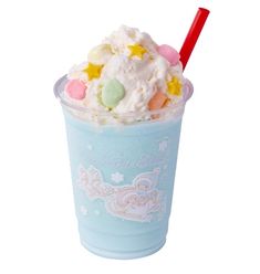 a blue cup filled with ice cream and candy