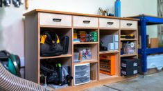 a wooden shelf filled with lots of items