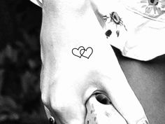 Interlocking Hearts Tattoo, Interlocking Heart Tattoo, Two Hearts Tattoo, Heart Tattoo On Finger, Small Cross Tattoos, Love Heart Tattoo, Horrible Tattoos, Remove Tattoo, Heart Tattoo Wrist