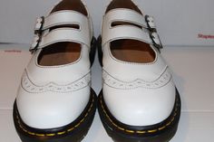 Doc Marten x Comme des Garcons, white double buckle shoes.  Made in England.  UK 7, US Ladies 9, US men 8.  Excellent condition. Please read all measurements and view all photos provided before purchasing as I do NOT accept returns. I do my best to list accurate measurements and notate all visible flaws/signs of wear. I am happy to send additional pictures of any listing. I am not responsible for lost or damaged packages during shipping. Insurance can be purchased at an additional cost. International buyers please contact me for shipping quotes. Please note: Vintage items are not new and it is expected that there will be signs of age and wear. Vintage sizes run smaller than ones today, so the best method to judge size is to compare the above measurements to a garment you have that fits you Dombas Shoes, Buckle Shoes, Us Man, Doc Martens, Loafers For Women, Aging Signs, Loafers, Buckle, Slip On