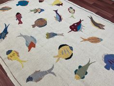 an area rug with fish on it