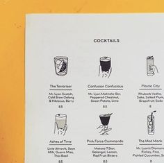 a menu listing different types of cocktails and drinks on the side of a yellow wall