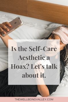 a woman laying on top of a bed holding a cell phone and texting is the self - care aesthetic a hoa? let's talk about it