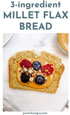 a piece of bread with fruit and nuts on it