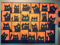 an orange and black painting with cats on it