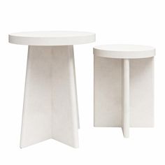 two white tables sitting next to each other