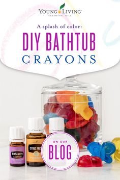 a jar filled with lots of colorful candies next to bottles of essential oils and the words diy bathtub crayons