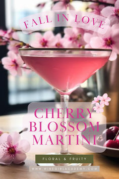 the cherry blossom martini is served in a coupe glass with cherries on the side