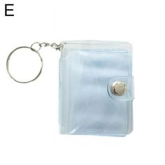 a clear plastic bag with a metal keychain attached to the front of it