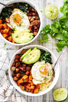 two bowls filled with eggs, beans and avocado