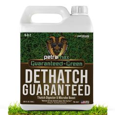 a gallon of green dethatch guaranated on the ground with grass around it