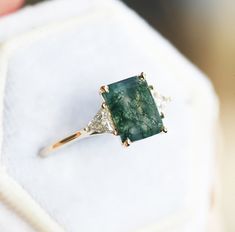 Emerald Cut Moss Agate Engagement Ring, Three Stone Moss Agate Ring With Side Triangle Diamonds - Etsy Moss Agate Engagement Ring Square, Rectangle Moss Agate Ring, Vintage Moss Agate Ring, Mossy Agate Wedding Ring, Moss Agate Engagement Ring Emerald Cut, Emerald Cut Moss Agate Ring, Green Moss Agate Engagement Ring, Miss Agate Engagement Ring, Green Stone Engagement Ring