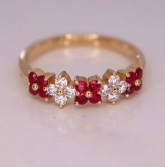 Luxury Ruby Flower Ring In Fine Jewelry Style, Luxury Ruby Flower Ring Fine Jewelry, Ruby Ring Designs, Ruby Wedding Band, Ladies Rings, Fancy Jewelry Necklace, Ruby Wedding, Flower Band, Unique Diamond Rings