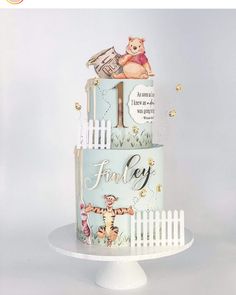 a winnie the pooh themed birthday cake