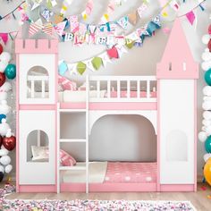 a pink and white castle bed with balloons on the wall next to it in a room decorated for a birthday party