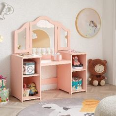 a child's bedroom with a pink desk and mirror