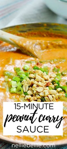 a close up of a bowl of soup with celery and peanuts on top