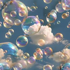 soap bubbles floating in the air on a sunny day with blue sky and clouds behind them