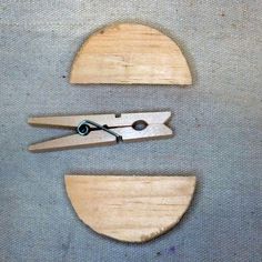 two pieces of wood with scissors on them