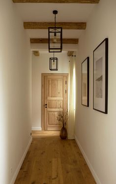 the hallway is clean and ready to be used as a place for pictures or photographs