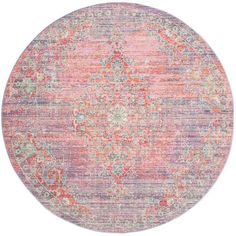 a round rug with an ornate design in pink, blue and orange colors on a white background