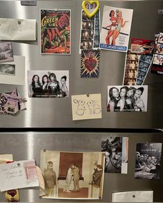 the refrigerator is covered with magnets and pictures