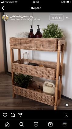 a wooden shelf with baskets and bottles on it