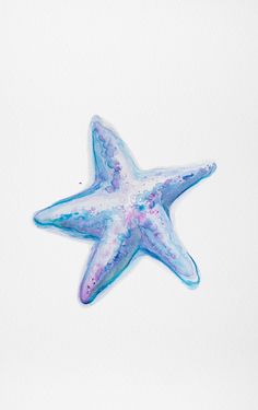 a blue and white starfish floating in the air