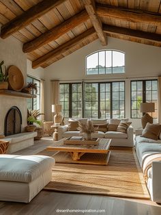 a living room filled with furniture and a fire place in the middle of it's walls