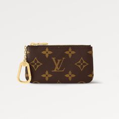 The Key Pouch In Iconic Monogram Canvas Is A Playful Yet Practical Accessory That Can Carry Coins, Cards, Folded Bills And Other Small Items, In Addition To Keys. Secured With An Lv-Engraved Zip, It Can Be Hooked Onto The D-Ring Inside Most Louis Vuitton Bags, Or Used As A Bag Or Belt Charm. 4.7 X 2.8 X 0.4 Inches (Length X Height X Width) Monogram Coated Canvas Grained Cowhide-Leather Lining Gold-Color Hardware Zip Closure Key Ring Chain With Hook This Has Been Worn But Only Shows Slight Wear O Designer Wishlist, Lv Key Pouch, Louis Vuitton Key Pouch, Purse Essentials, Key Pouch, Ring Chain, Keychain Wallet, Bags Louis Vuitton, Lv Monogram