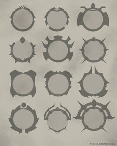 a bunch of different shapes and sizes of circular objects on a sheet of gray paper