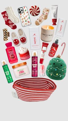 the contents of a christmas gift basket are arranged in an array on a white background