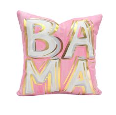 a pink and gold pillow with the word ba ma on it