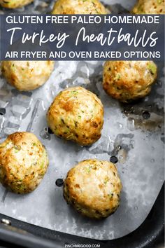 cooked meatballs on a baking sheet ready to go in the oven or grilling